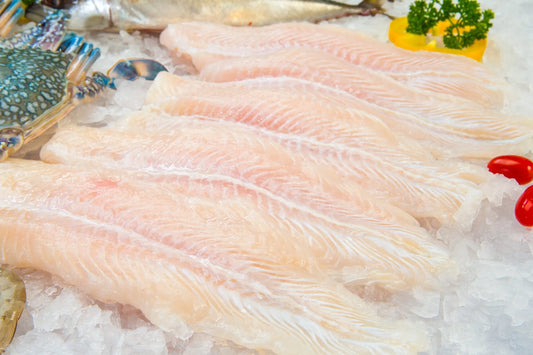 Fillet of Fish Pangasius on ice